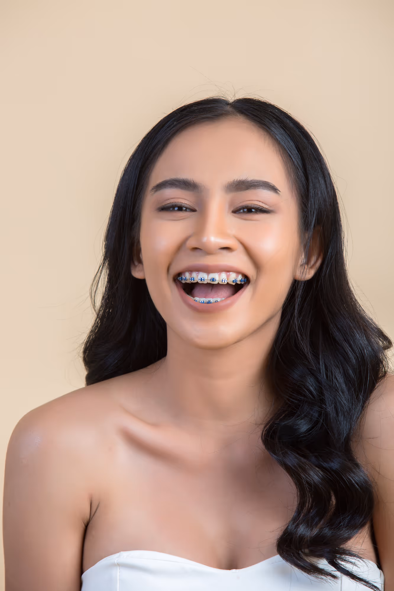 Adult with Metal Braces smiling